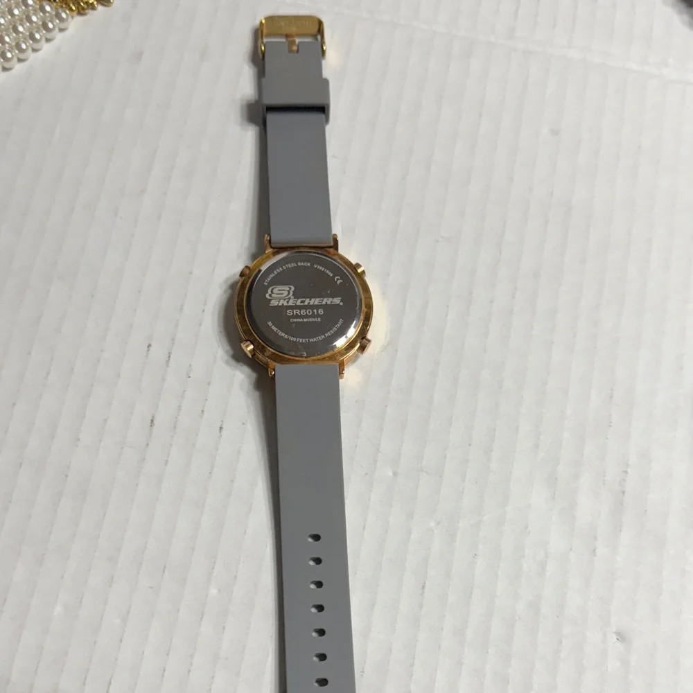 Skechers Smartwatch with Gold Bezel and Gray Strap